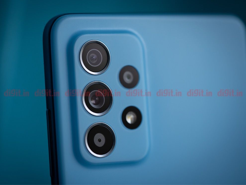 The rectangular camera module on the Galaxy A52 is tucked away in the top-left corner and is slightly raised than the rest of the body.