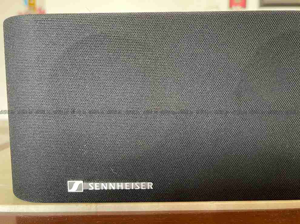 The Sennheiser logo is in the bottom left of the Ambeo soundbar.