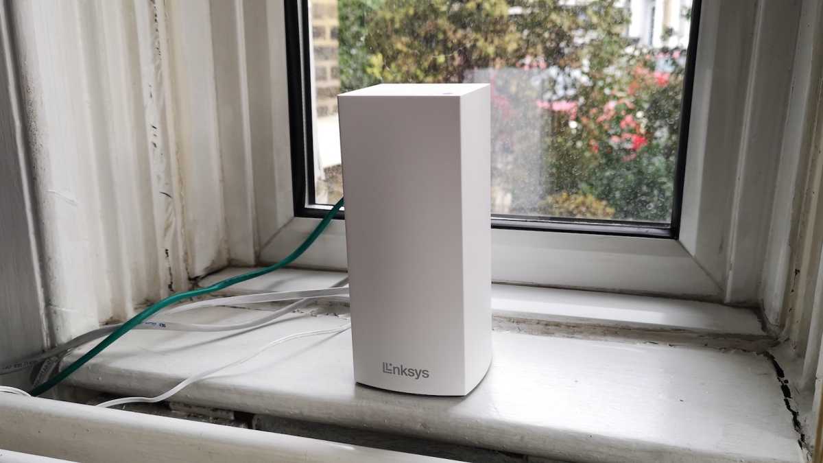 A single Linksys Atlas 6 unit connected to a modem, sat on a window ledge