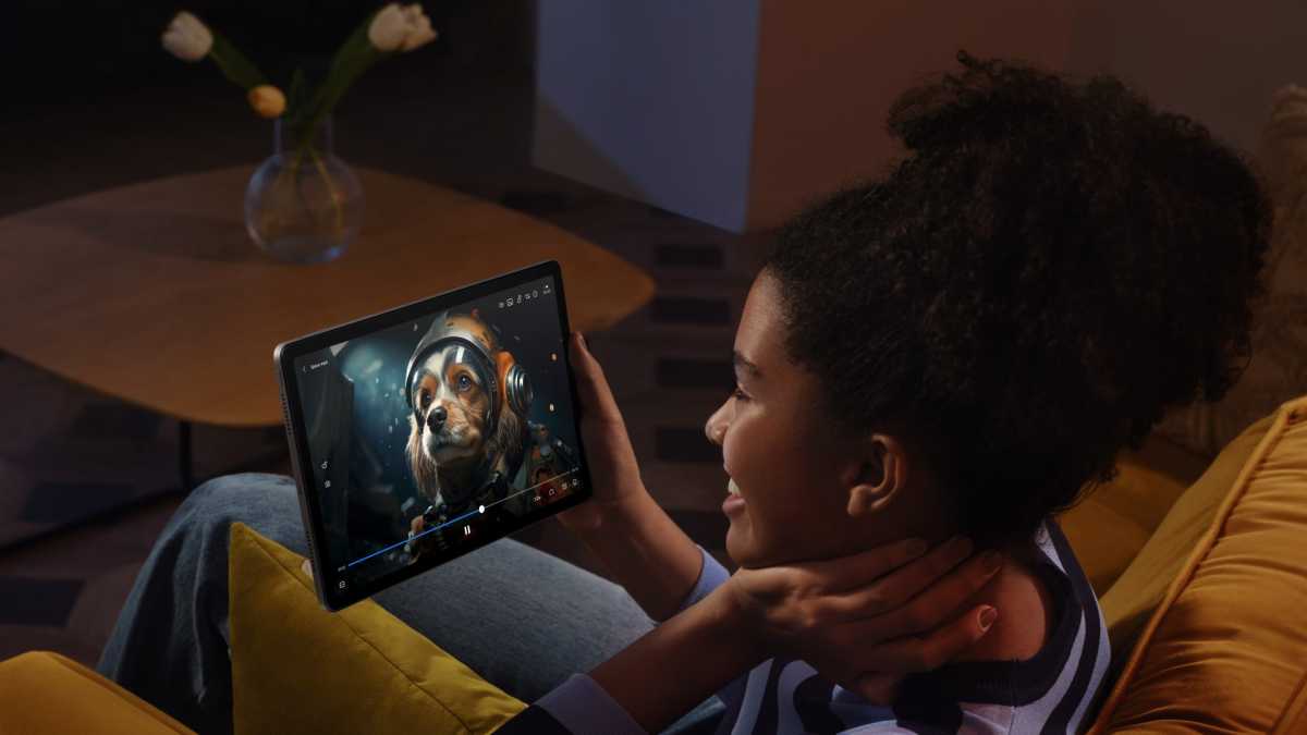 User watching video on Xiaomi Redmi Pad SE