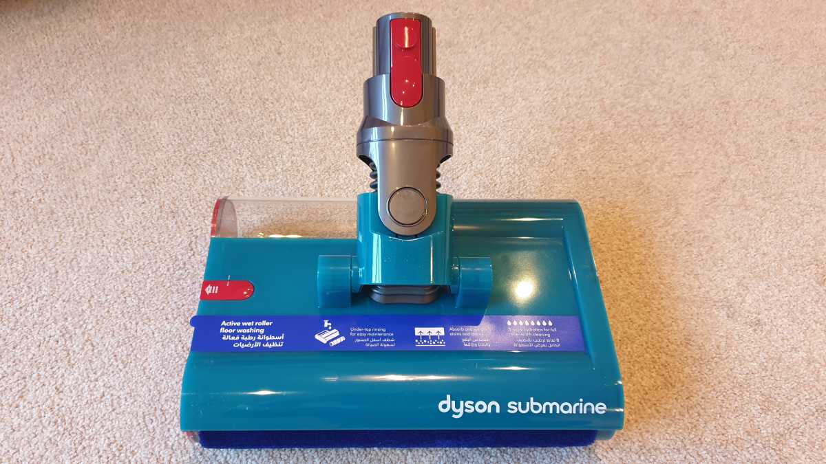 A view of the Dyson V15S Detect Submarine head on a beige carpet